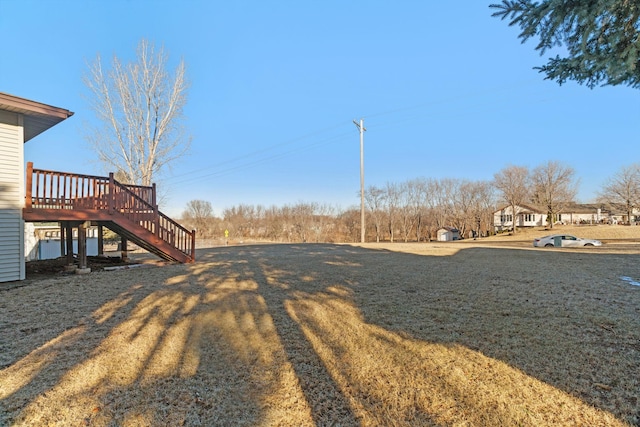 view of yard with a deck