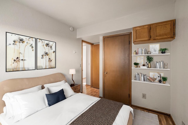 bedroom featuring light hardwood / wood-style floors