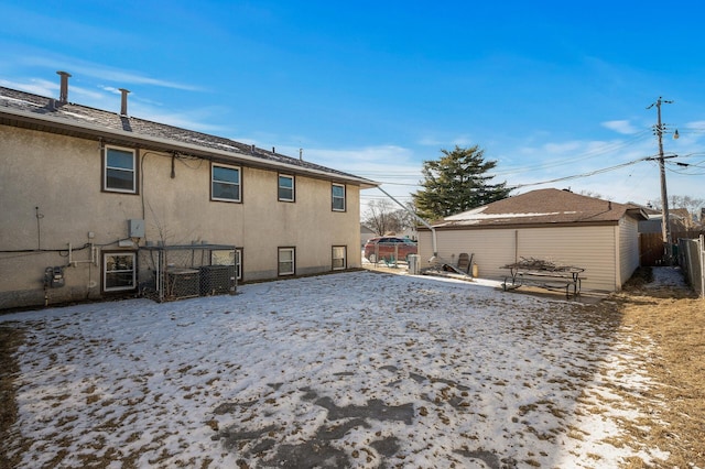 view of snow covered property