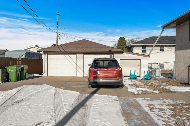 view of snow covered garage