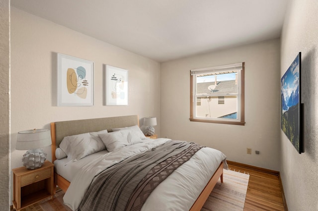 bedroom featuring wood-type flooring