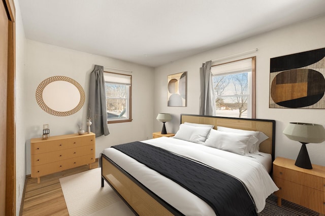 bedroom featuring light hardwood / wood-style floors