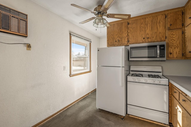 kitchen with ceiling fan and white appliances