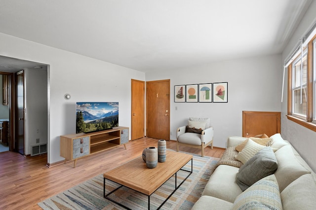 living room with light wood-style floors