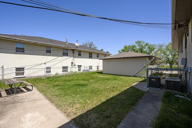 view of yard with central AC unit