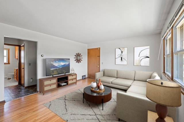 living area with wood finished floors