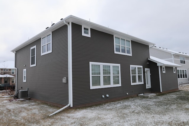 rear view of property with central air condition unit