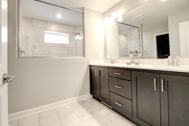 bathroom featuring tile patterned floors and vanity