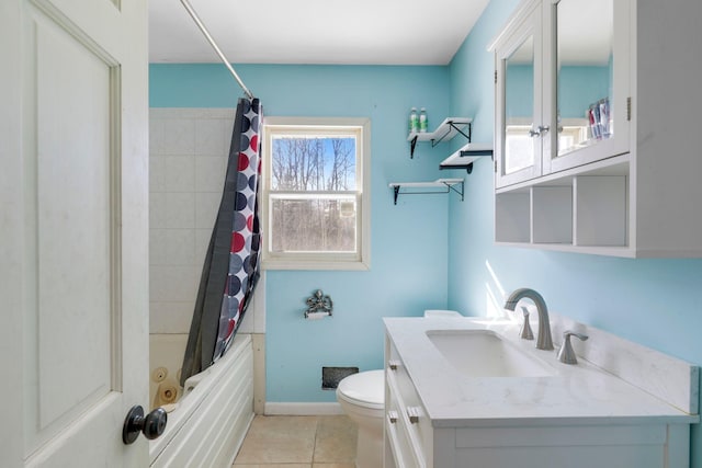 bathroom featuring shower / tub combo, baseboards, toilet, tile patterned flooring, and vanity