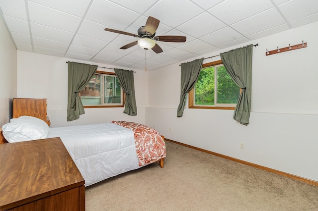 16331 Crosstown Blvd NW, Andover, MN 55304 - bedroom with carpet floors, a paneled ceiling, baseboards, and ceiling fan