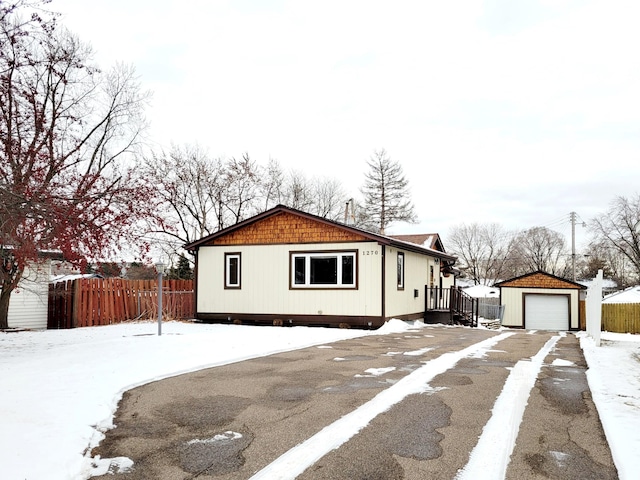 view of front of home featuring an outbuilding and a garage