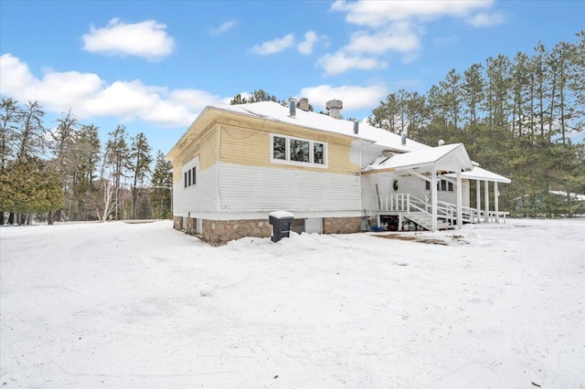 view of snow covered property