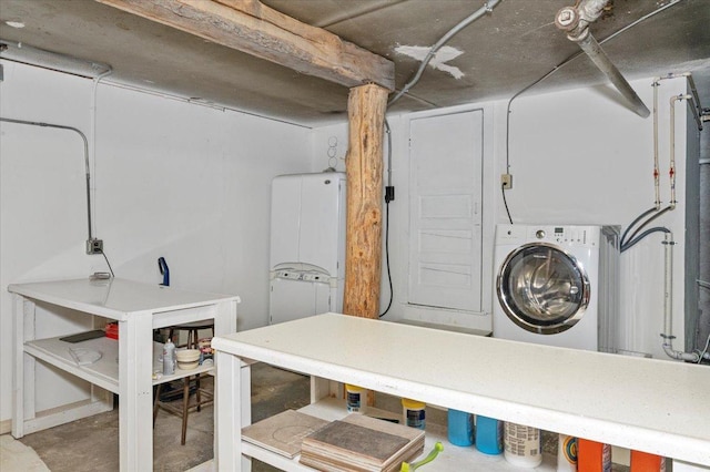 washroom with washer / clothes dryer