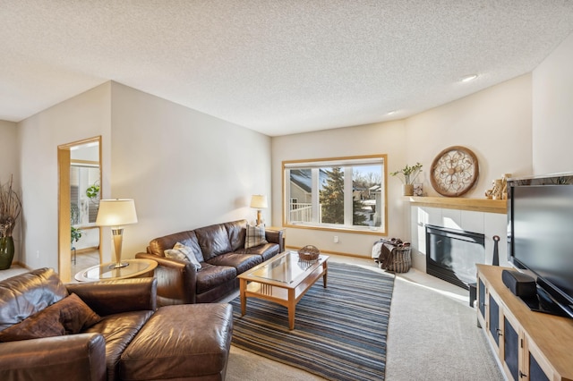 living room featuring a textured ceiling and carpet