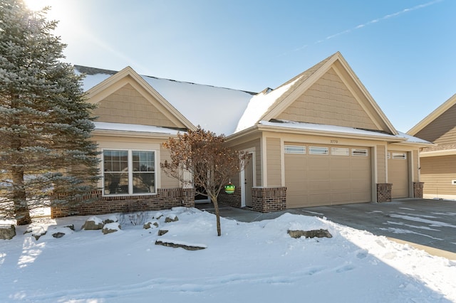 view of front of house featuring brick siding