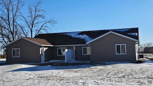 view of snow covered house