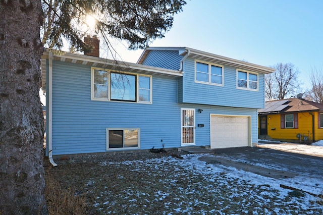 view of front of property featuring a garage