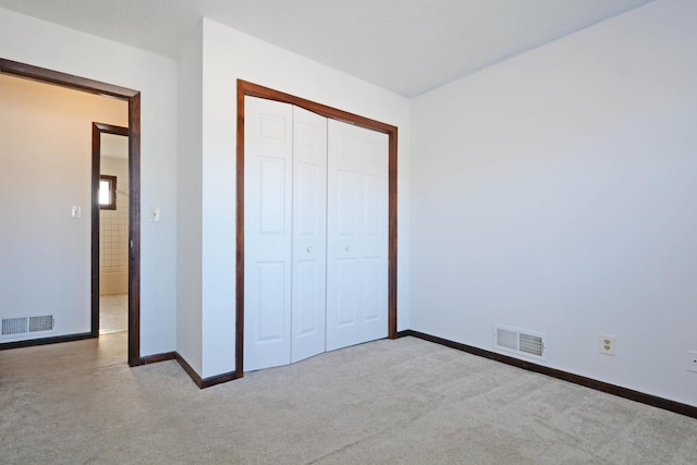 unfurnished bedroom with a closet