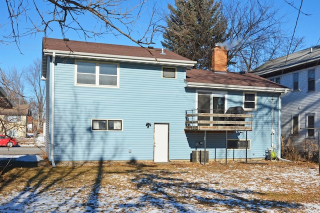 view of snow covered property