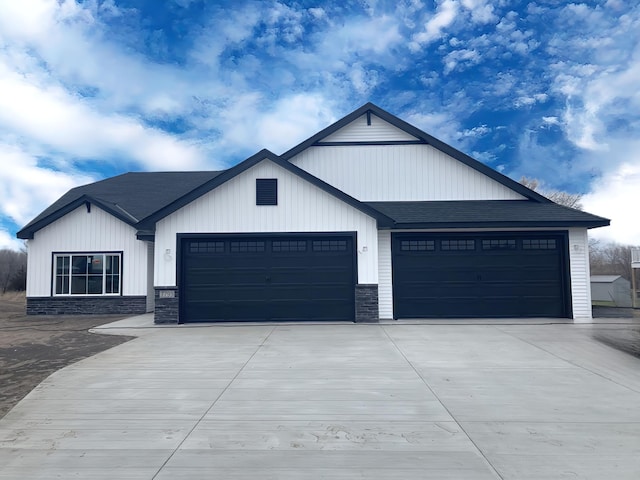 modern farmhouse with a garage