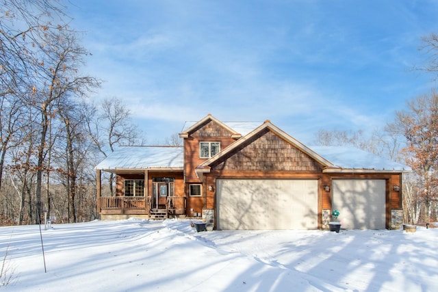 view of front of home featuring a garage and covered porch