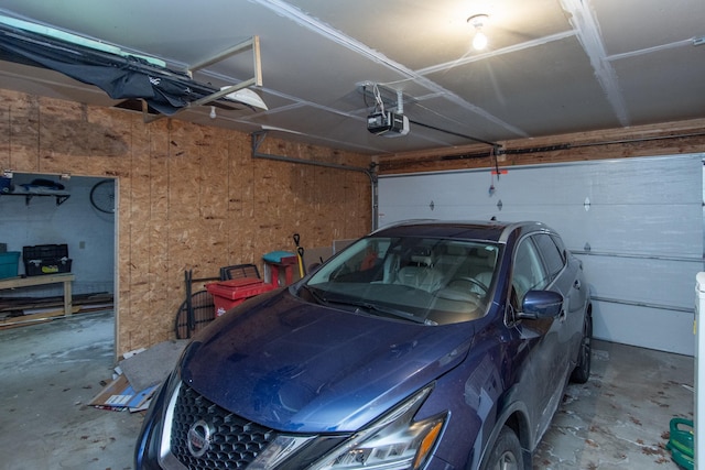 garage featuring a garage door opener