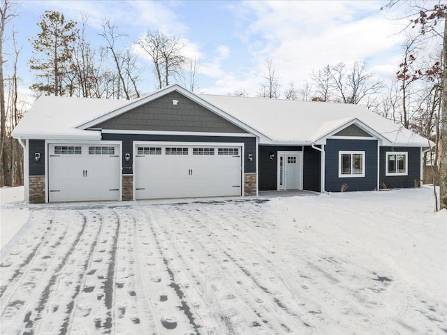 ranch-style house featuring a garage