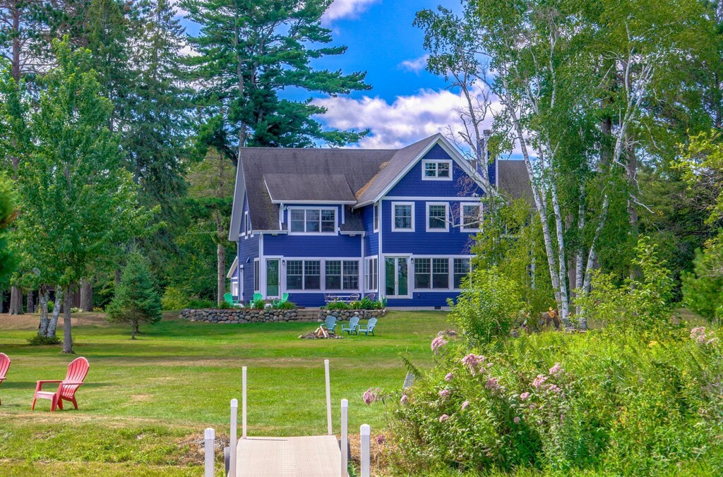 5781 Spruce Ln, Stone Lake, WI 54876 - back of house featuring a yard