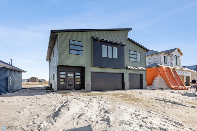 view of front of house with a garage