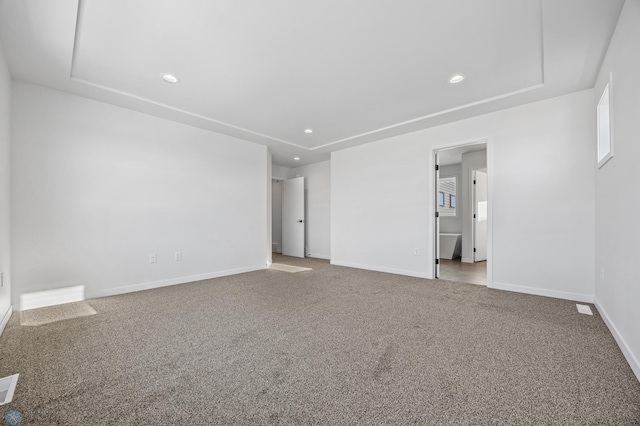 spare room featuring carpet floors