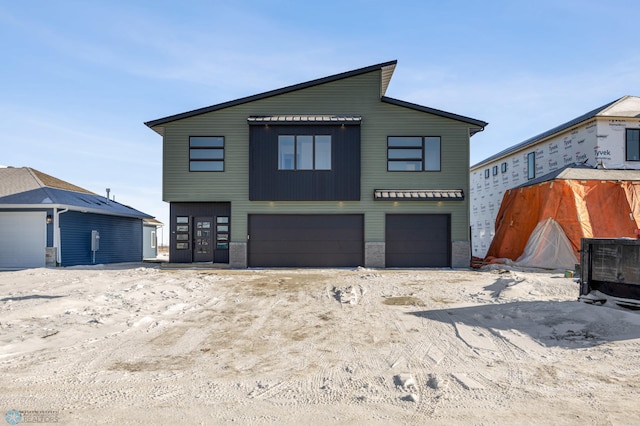 view of front of home featuring a garage