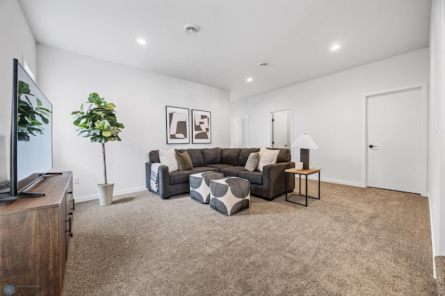 carpeted living room with baseboards and recessed lighting