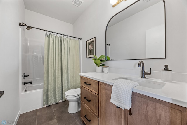 bathroom featuring shower / bath combination with curtain, visible vents, vanity, tile patterned floors, and toilet