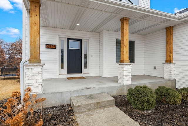 entrance to property with a porch