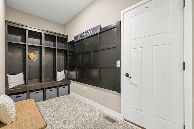 mudroom with visible vents and baseboards