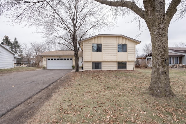 tri-level home featuring a garage