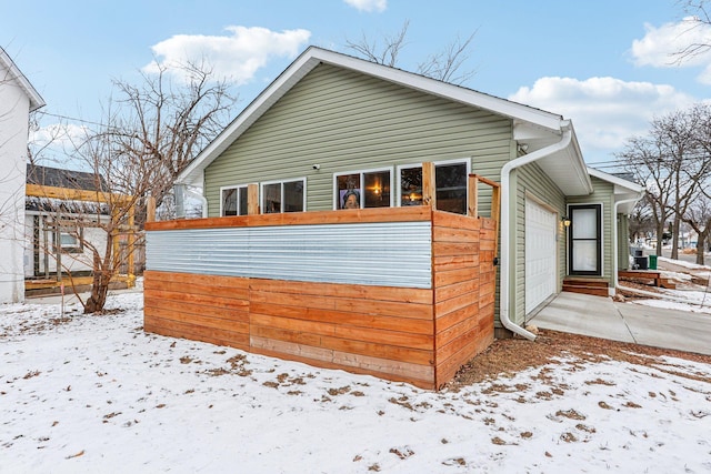 view of snow covered property