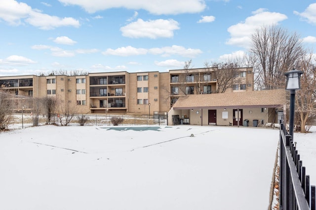 view of snow covered property