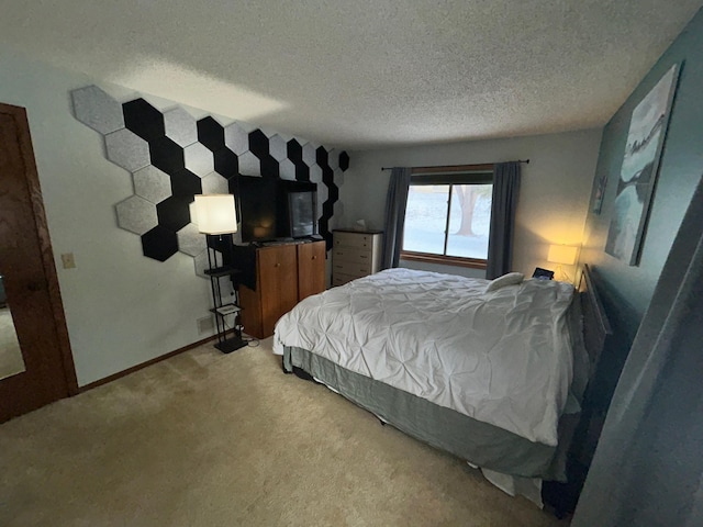 carpeted bedroom featuring a textured ceiling