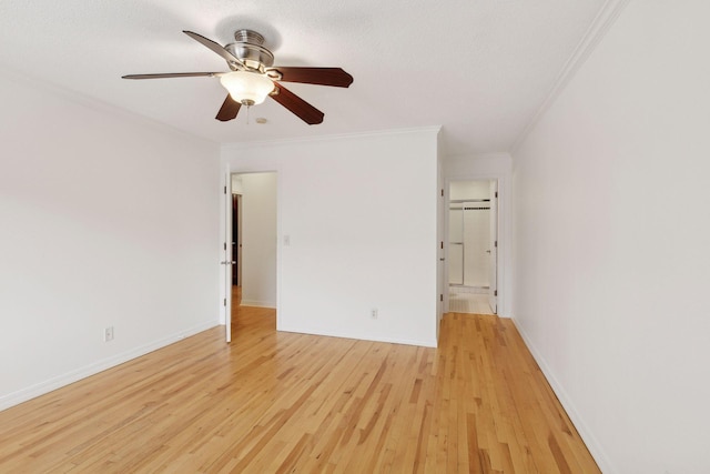 unfurnished bedroom featuring ceiling fan, crown molding, light hardwood / wood-style flooring, and a textured ceiling