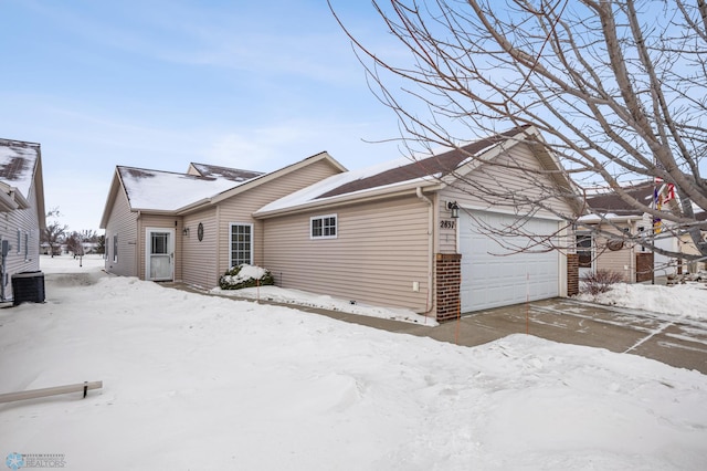 exterior space with a garage