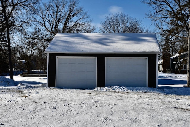 view of snow covered garage