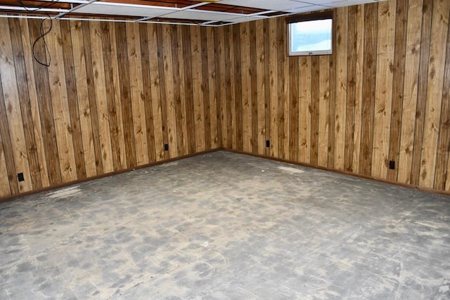 basement with wood walls