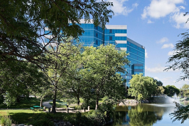 view of building exterior with a water view