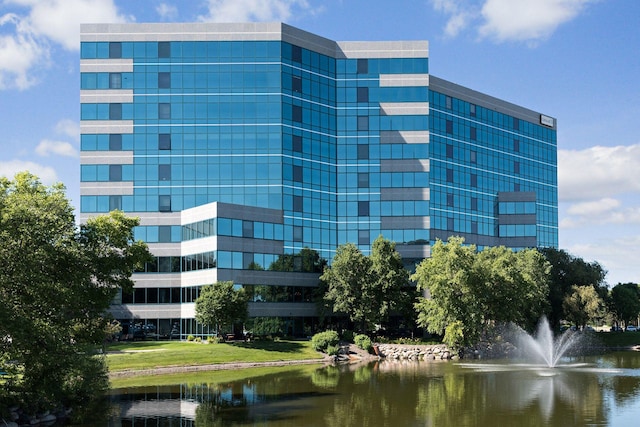 view of building exterior featuring a water view