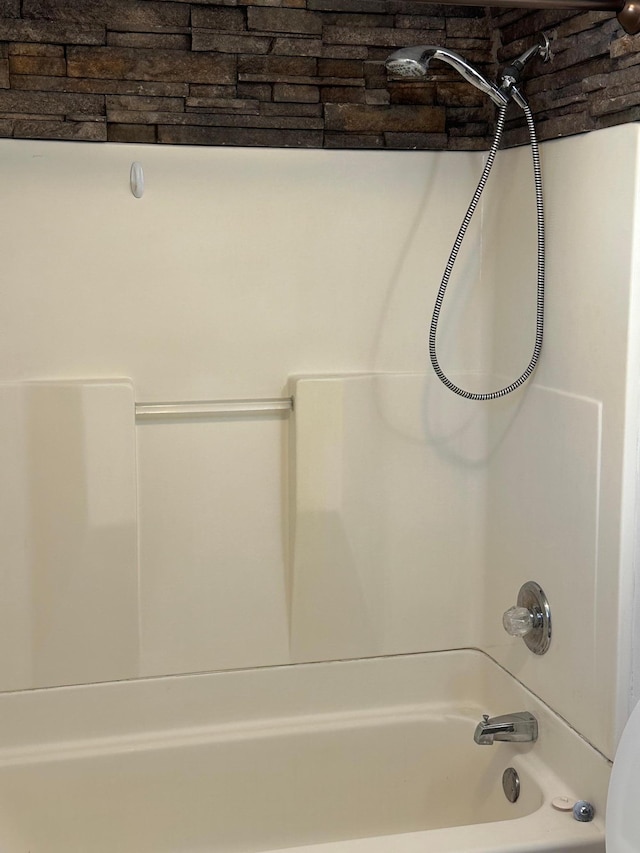 bathroom with shower / bath combination