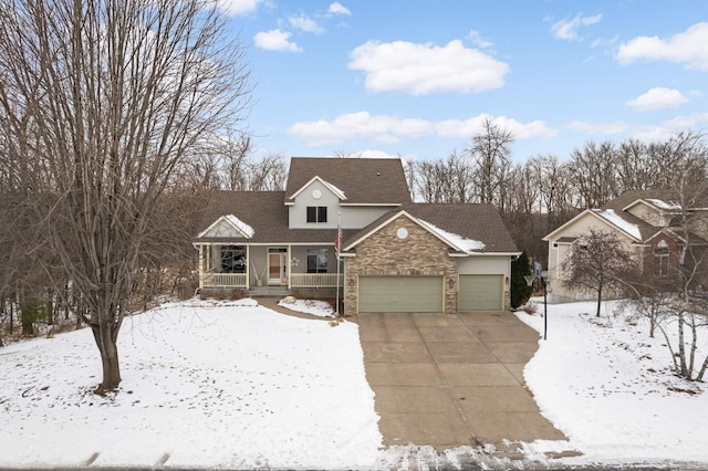 front facade featuring a garage and covered porch