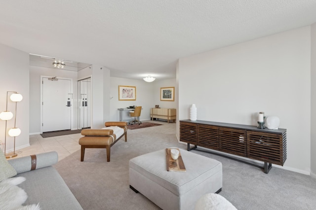 living room with light carpet and a textured ceiling