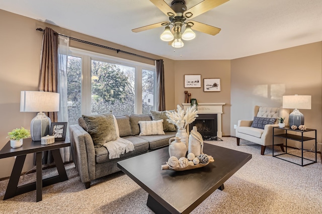 living room with ceiling fan and light colored carpet