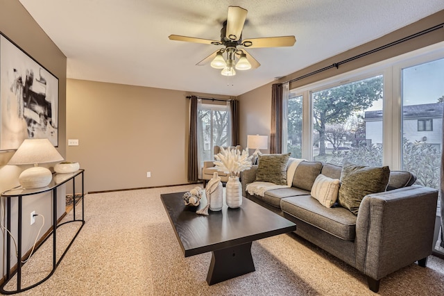 living room featuring ceiling fan